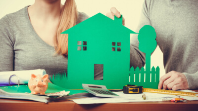 KfW-Förderung Wohneigentum für Familien mit verlängerter Zinsbindung Familienplanung für den Hausbau mit KfW-Förderung und Energieeffizienz Maßnahmen