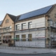 Kommunales Gebäude mit Photovoltaikanlage und Fassadensanierung im Rahmen der kommunalen Wärmewende