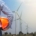 Industriemitarbeiter vor Windrädern - Symbol für Klimaschutzinvestitionen und grüne Jobs in der deutschen Industrie – Cornelius Ober GmbH